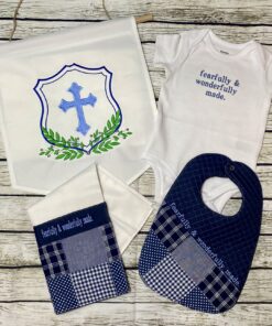 Blue handmade baby keepsake gift set with banner, bodysuit, bib, and burp cloth